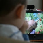 child watching tv photo by aplumb