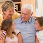 Grandparents laughing with grandchildren Grandparents laughing with grandchildren